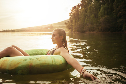 Young woman in lake containing attractive, away, and beautiful, a Person Photo by Jacob Lund
