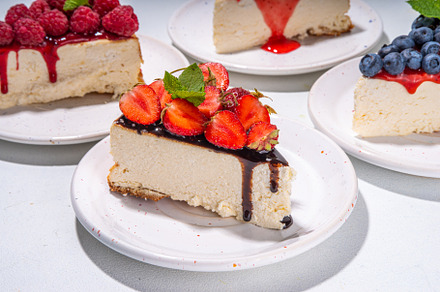 Summer cheesecake slices with various berry, a Food & Drink Photo by Rimma
