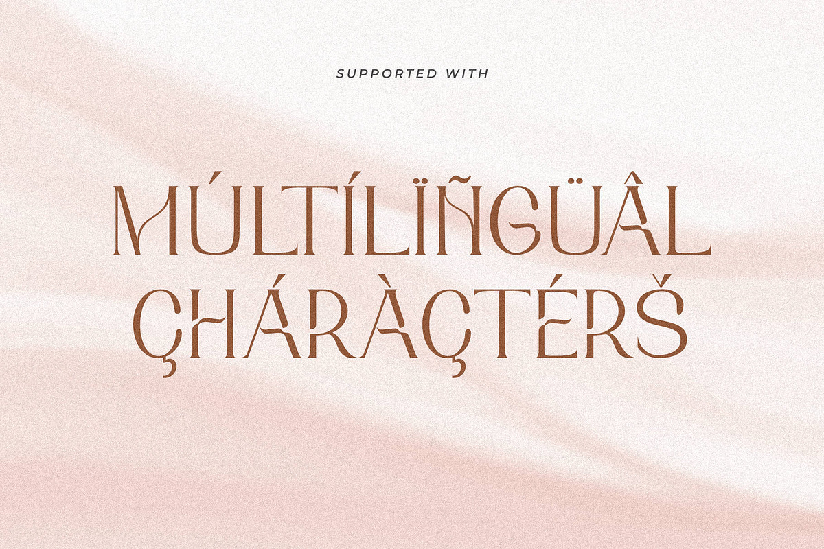 Kittova | An Elegant Serif Font, a Serif Font by Andrimada Creative (Photo 11 of 12)