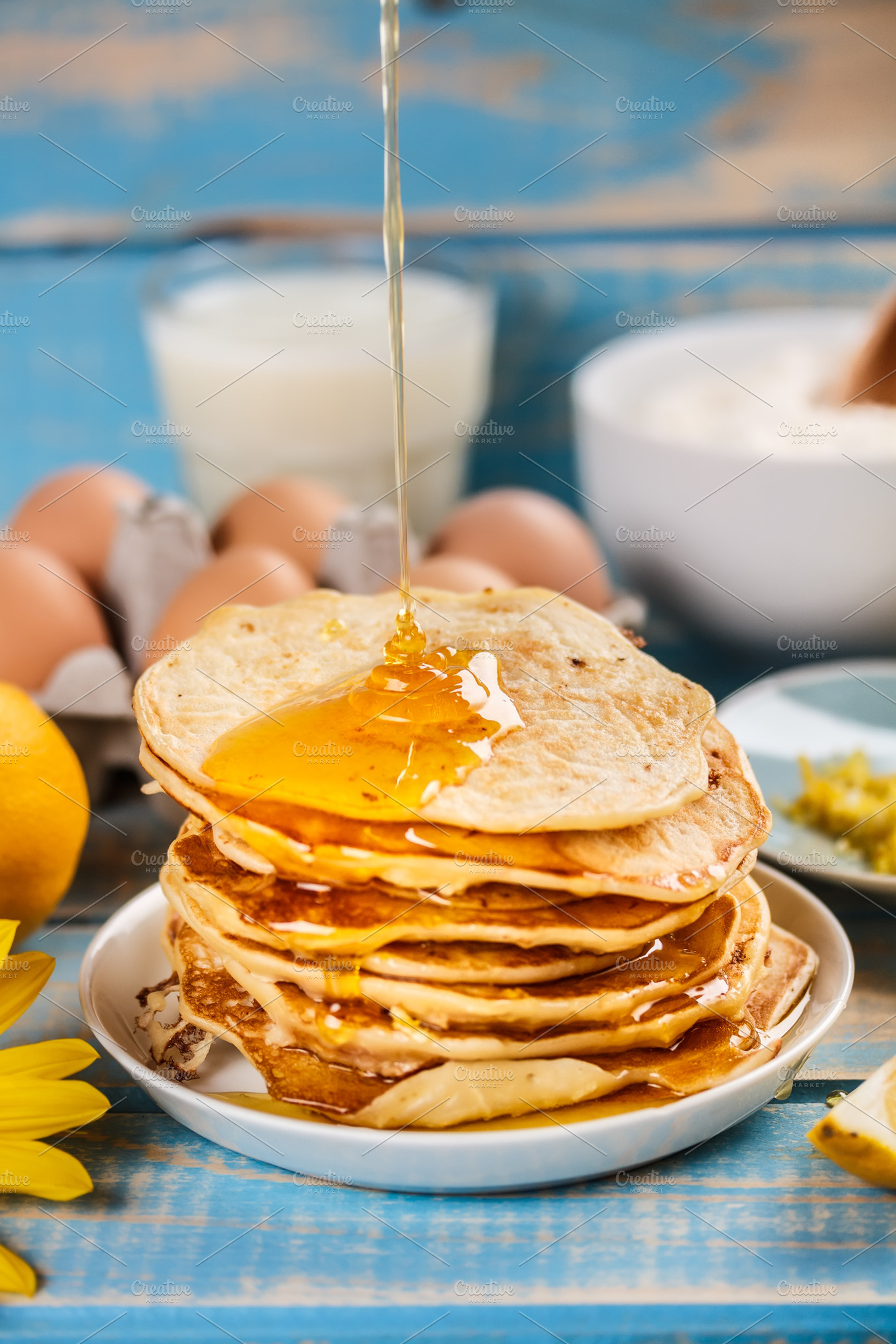 Stack of pancakes stock photo containing syrup and honey