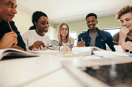 Group of multiracial people studying, a School & Education Photo by Jacob Lund