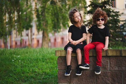 Boy and girl on the street containing boy, girl, and kids