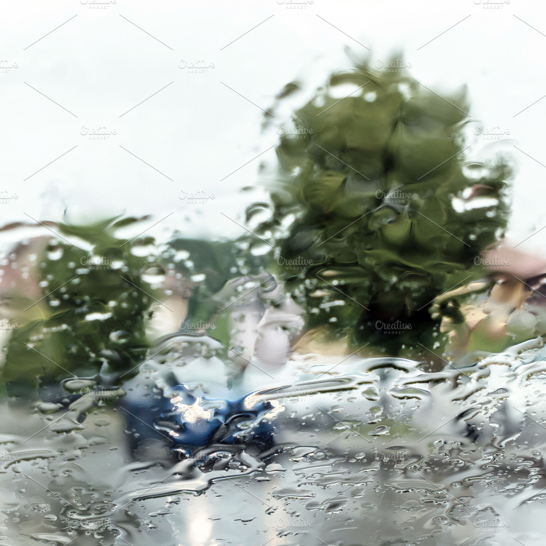 Rain shower on car windshield, a Transportation Photo by KYNA STUDIO
