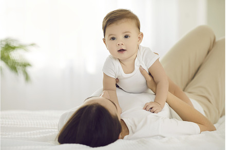 Happy adorable baby boy cuddling, a Person Photo by StudioRomantic