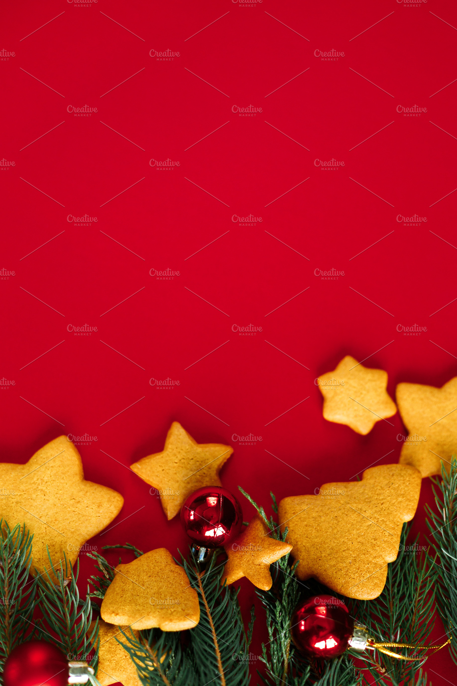 Christmas gingerbread cookies with red baubles and evergreen bra, a Photo by Sonjachni