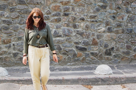happy smiling young brunette woman in sunglasses walking along t, a Person Photo by TanaCh