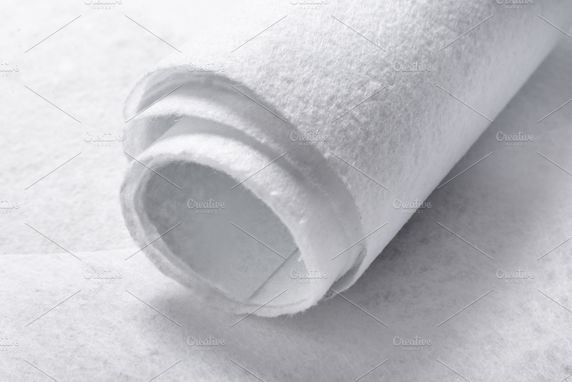 White Geotextile Fabric Sheets with Visible Texture, Close-Up, an Industrial Photo by MDBildes