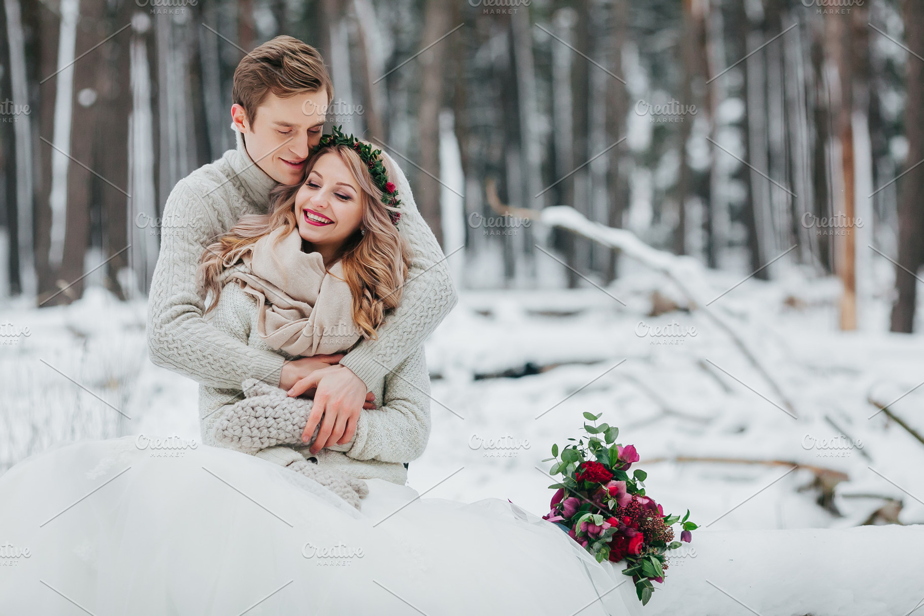 Bride and groom are hugging in the winter forest. Close-up. Winter wedding ceremony., a Person Photo by Stahov