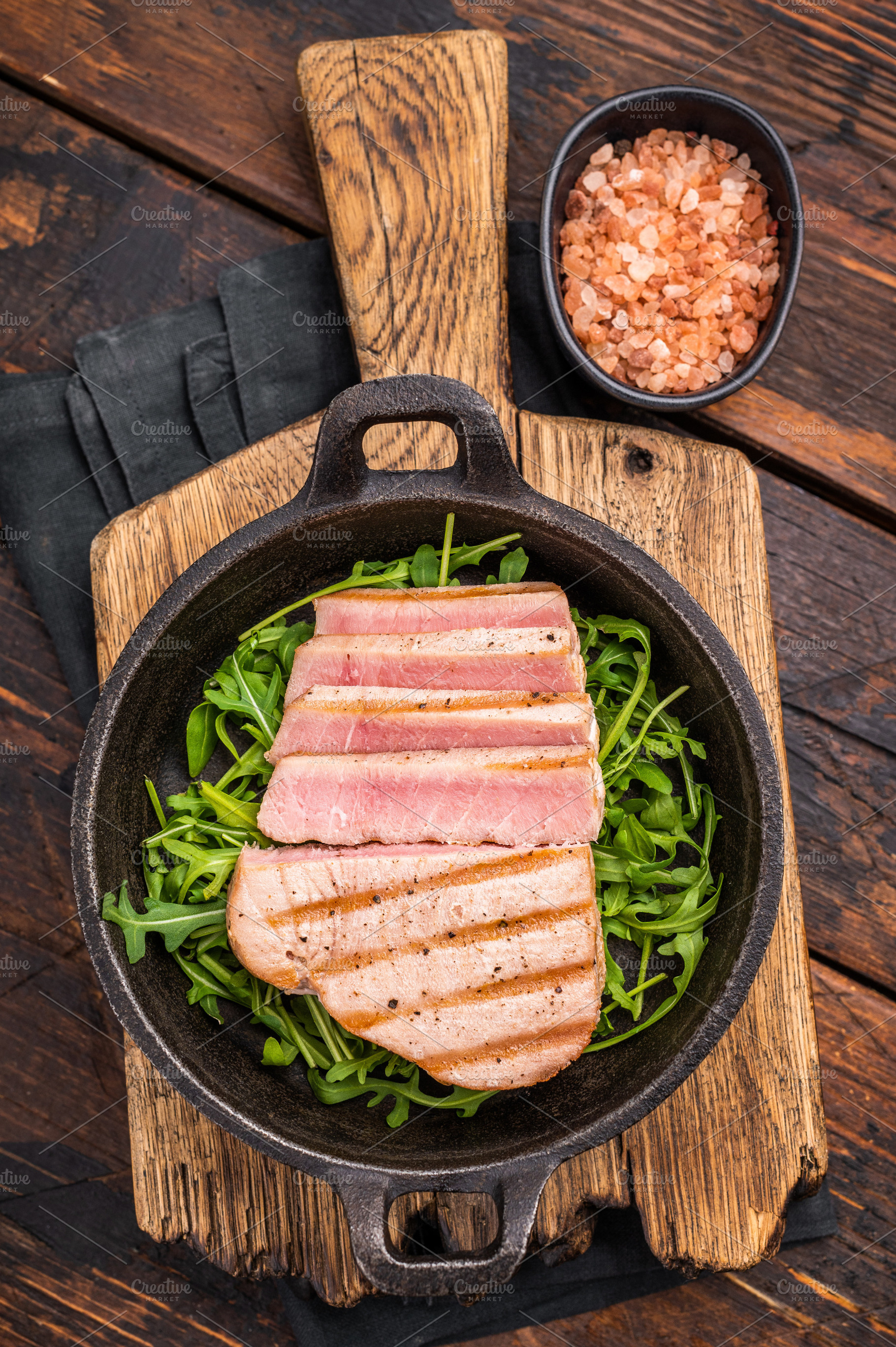 Tender grilled tuna steak on a bed of greens, an exquisite blend, a Food & Drink Photo by composter-box@mail.ru