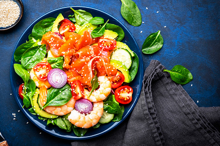Fresh salad for keto diet with salmon, avocado, spinach, cucumbe, a Food & Drink Photo by 5PH