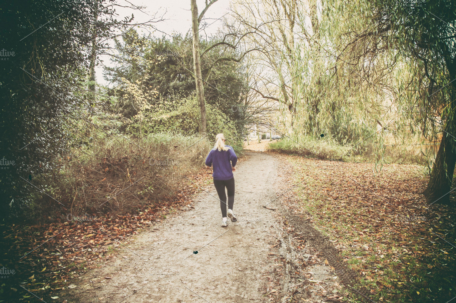 Woman running in colorful park