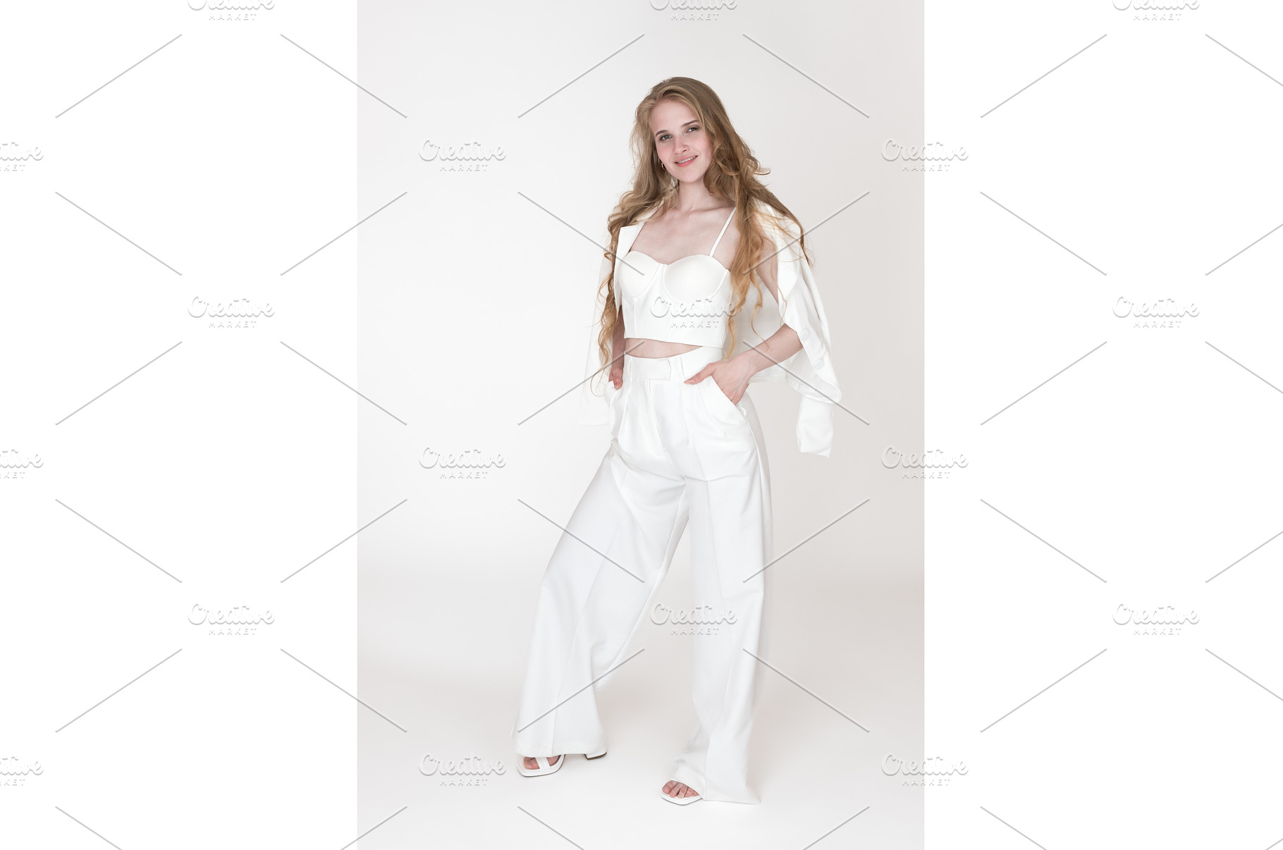 Woman stylishly dressed in white, a Person Photo by Alexander-Piragis