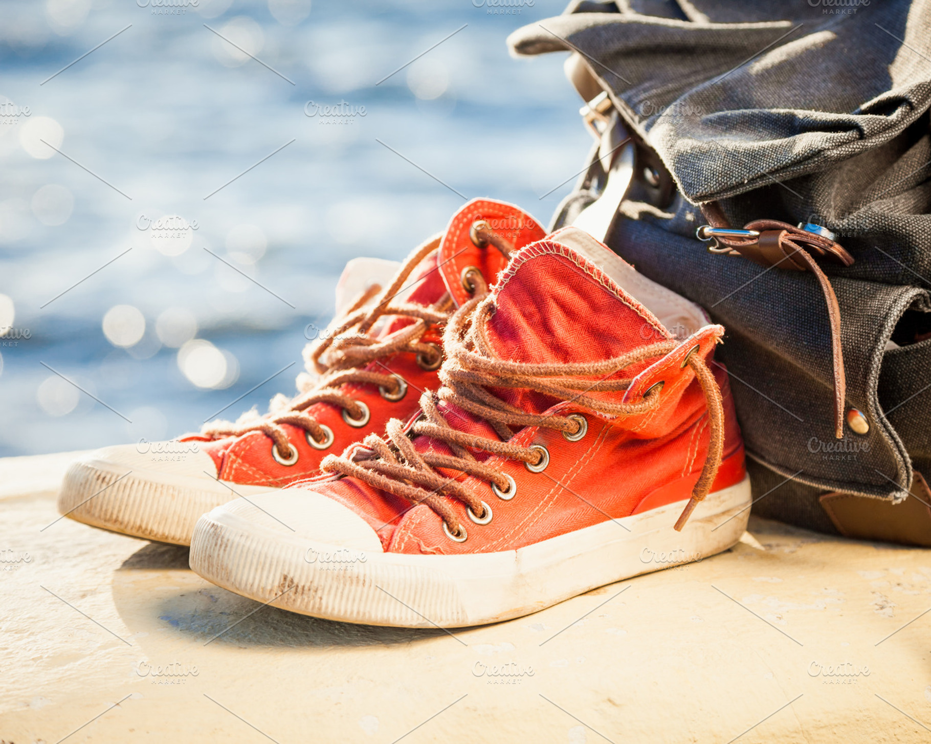 Red sneakers and backpack, a Beauty & Fashion Photo by chamillewhite