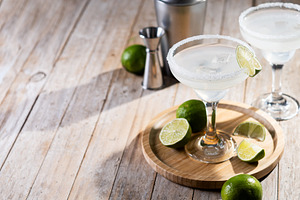 Classic margarita cocktail with lime and salt rim, a Food & Drink Photo by etorres69