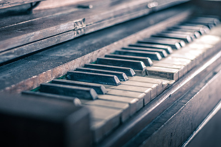 Antique piano stock photo containing music and piano