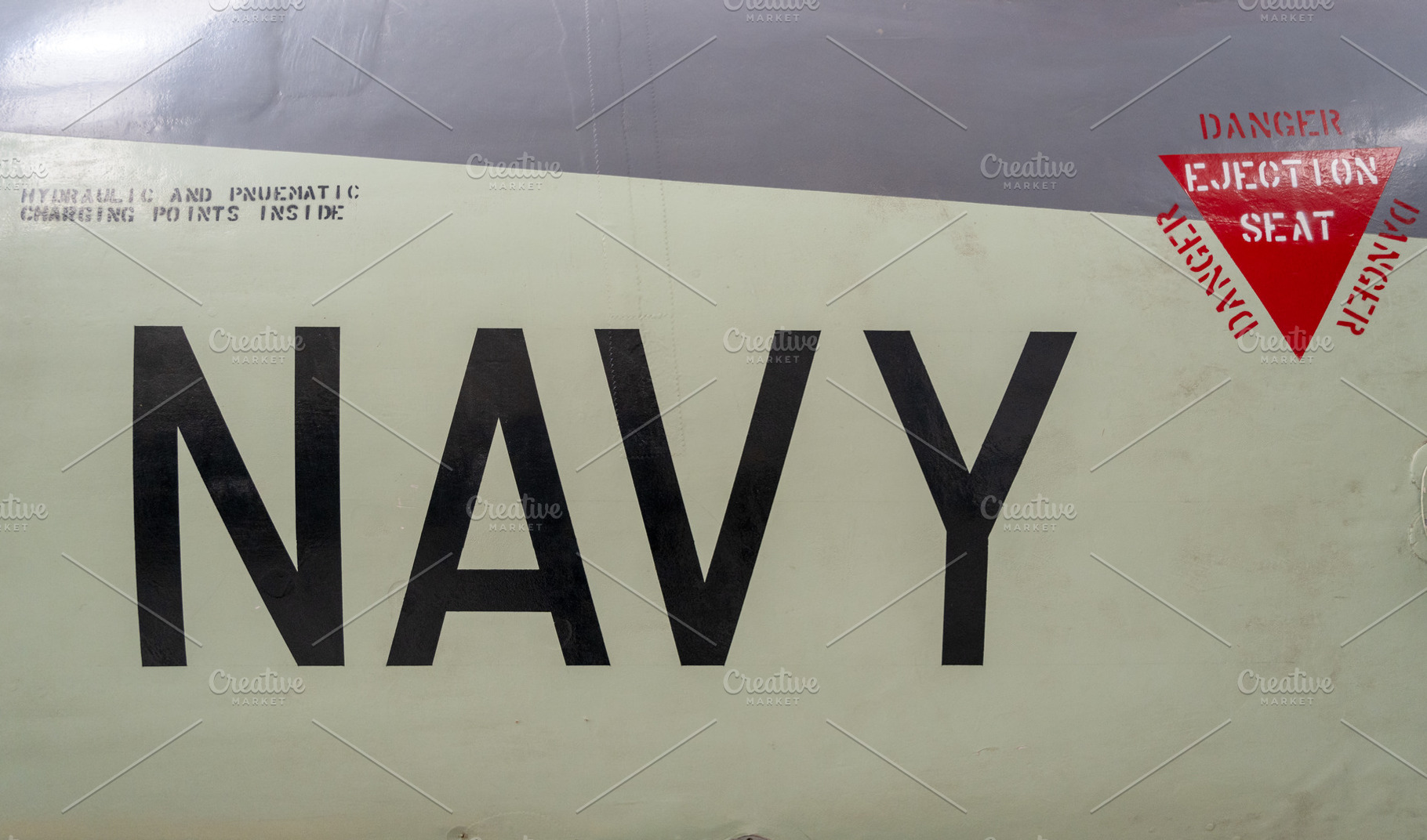 Vintage aircraft fuselage with navy markings and ejection seat w, a Transportation Photo by GoodGoods