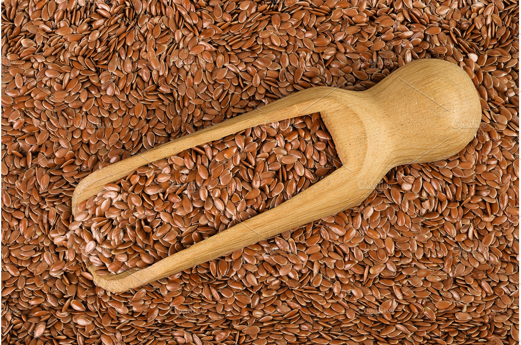 flaxseed in wooden scoop as a, a Food & Drink Photo by NataPhoto