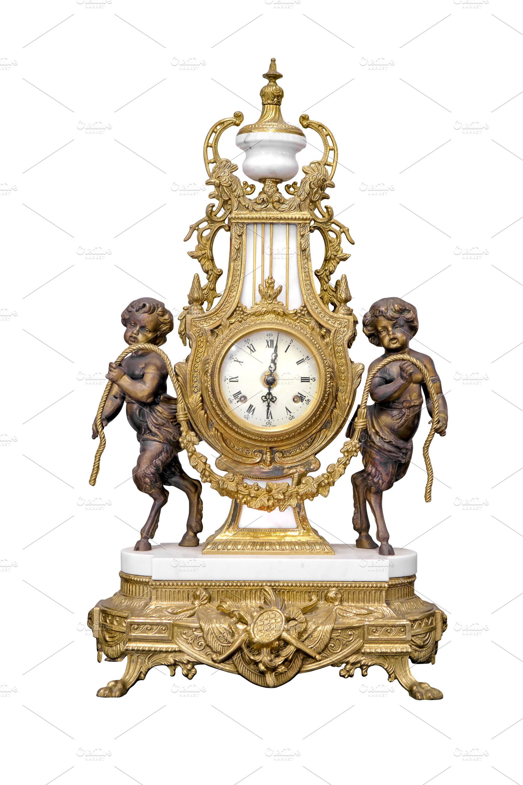 Antique golden clock isolated, an Arts & Entertainment Photo by BOOCYS