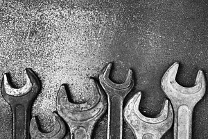 Old rusty wrenches containing metallic, auto, and metal