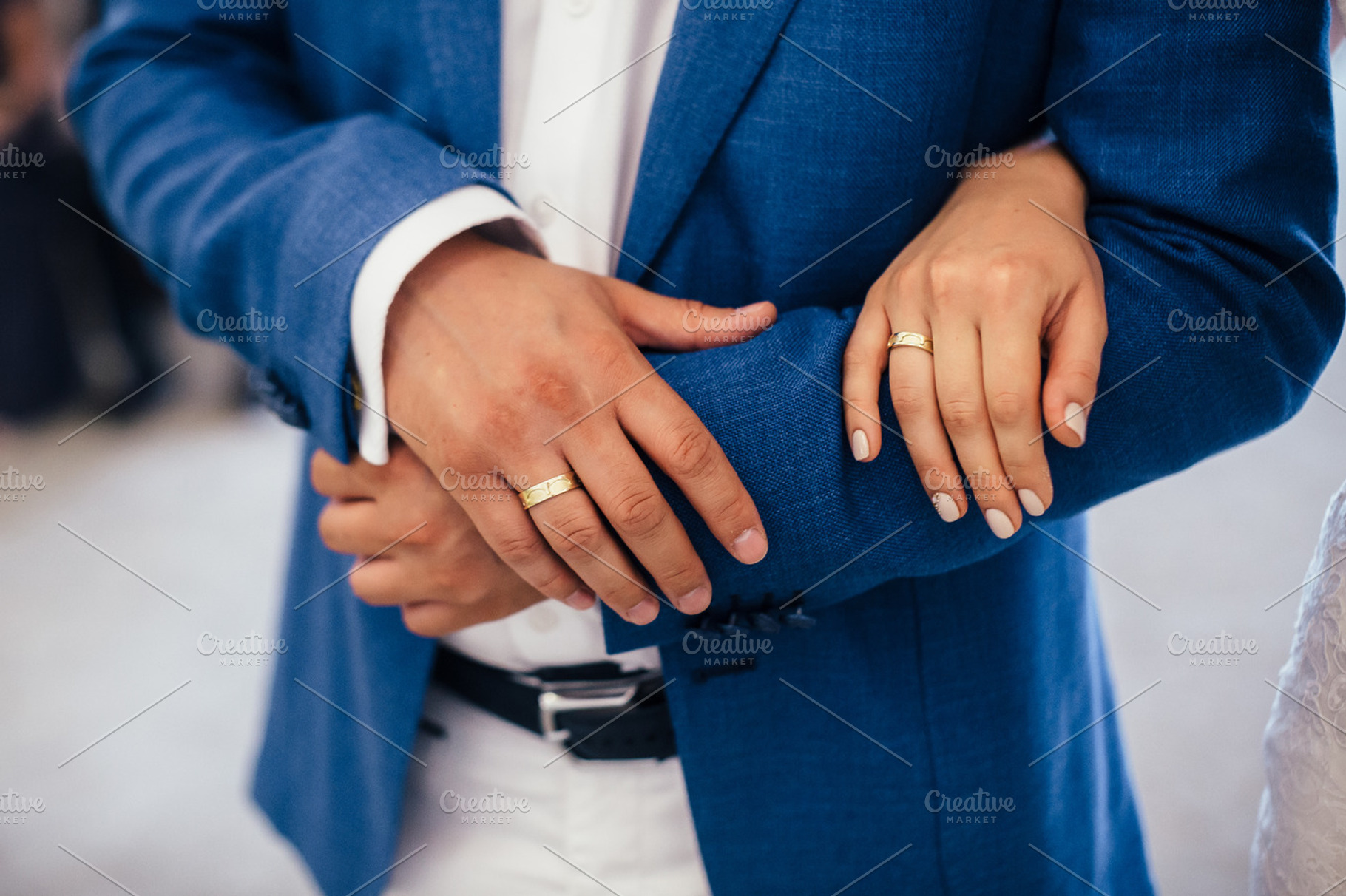 Hands of the Newlyweds, a Person Photo by DesignLab