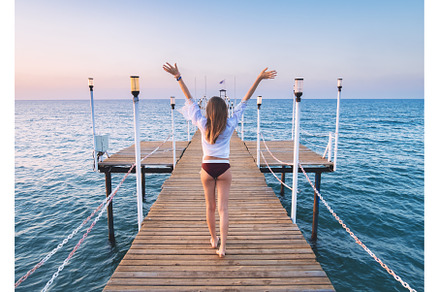 Happy young woman in bikini with, a Person Photo by den-belitsky