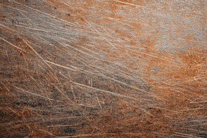 Textured brown and orange stone surface, a Background Photo by AlyaAnd