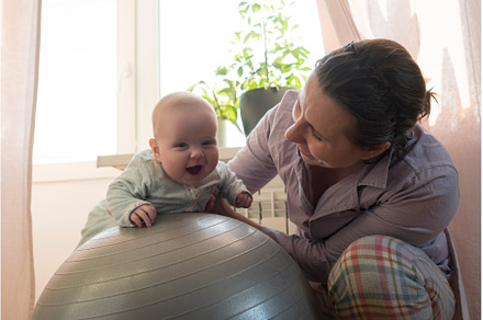 Mother and her baby girl having fun, a Sports & Recreation Photo by Koldunova