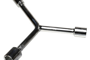 Metal socket wrench with hex profile on isolated background, clo, an Industrial Photo by ndanko