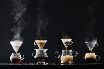 Multiple coffee cups with steam risi, a Photo by Iftikhar Alam
