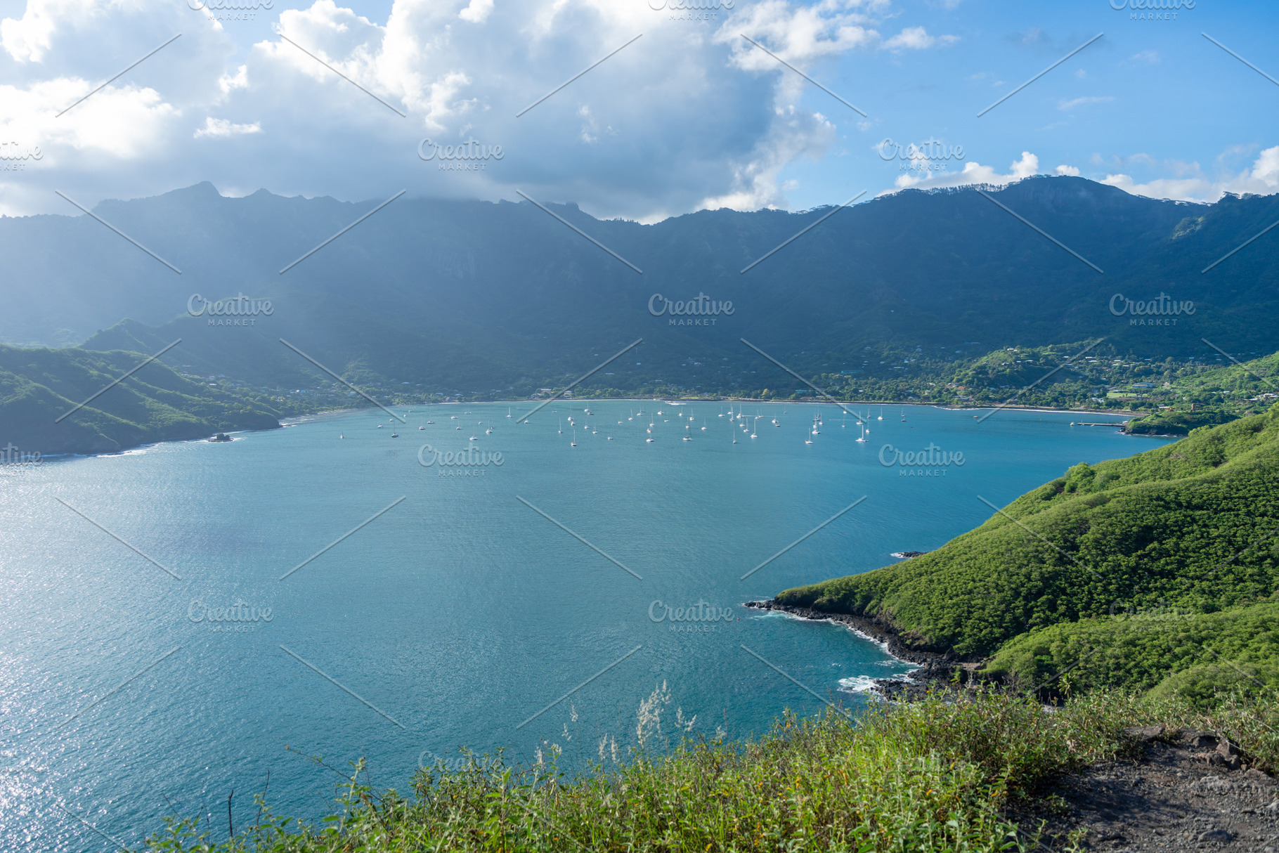 Taiohae Bay and town with anchored sailboats in Nuku Hiva, Marqu, a Nature Photo by GoodGoods