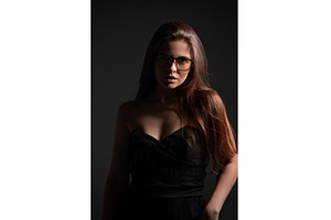 Woman wearing reading glasses with, a Person Photo by volodymyrshtun13795