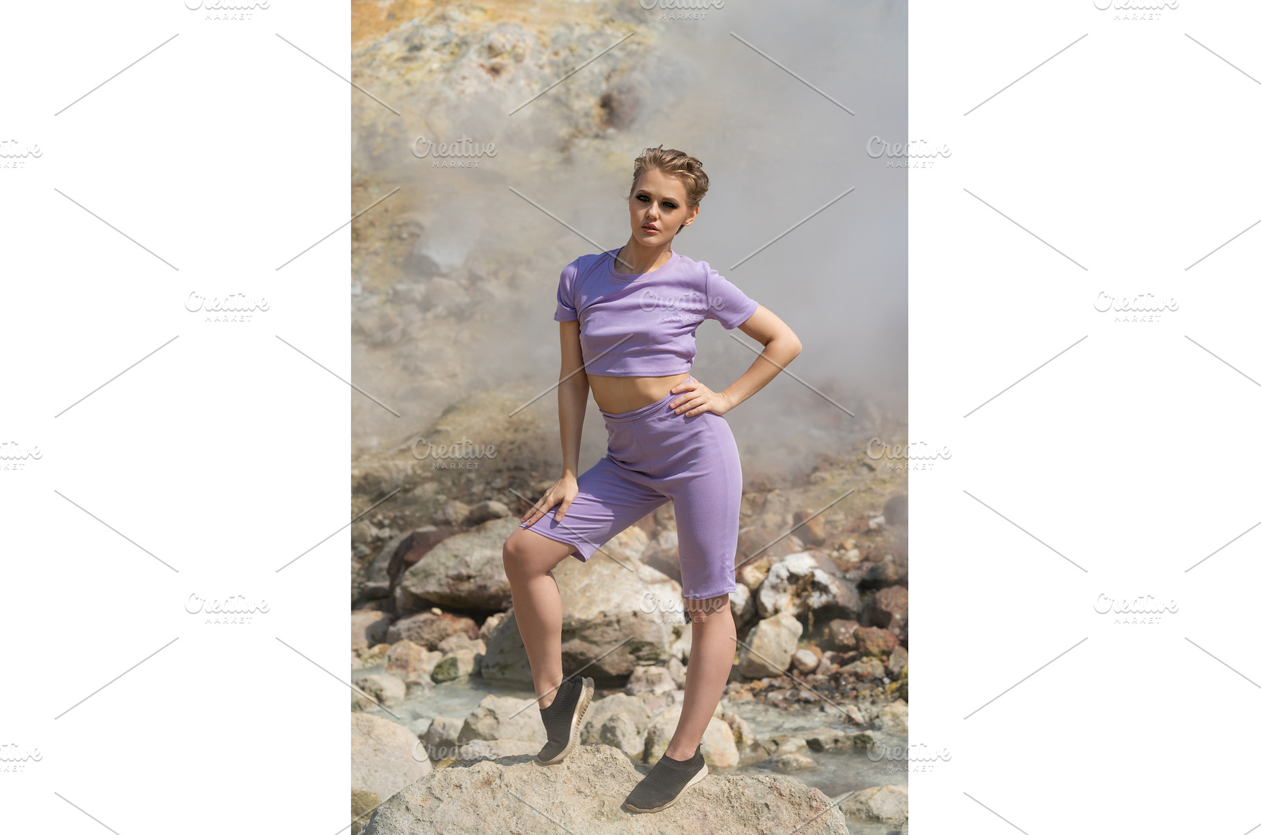 Slender trainer standing on rock in, a Person Photo by Alexander-Piragis