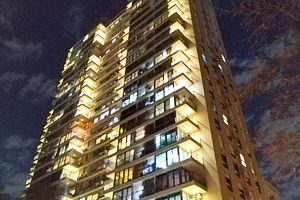 Modern apartment building night scene, montevideo, uruguay, an Architecture Photo by DanFLCreativo