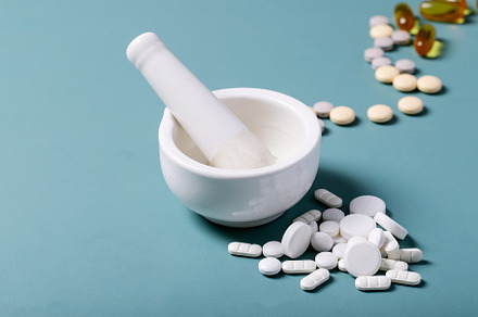 Medical pills and capsules containing drugs, tablets, and many