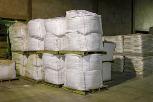 Wrapped Industrial Material Bales Stored Inside Warehouse, an Industrial Photo by Davizro's Market