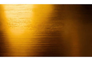 Shiny textured gold metal surface, a Background Photo by Igor Tichonow
