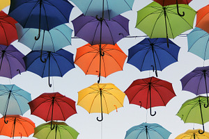 Colorful umbrellas containing sky, blue, and yellow