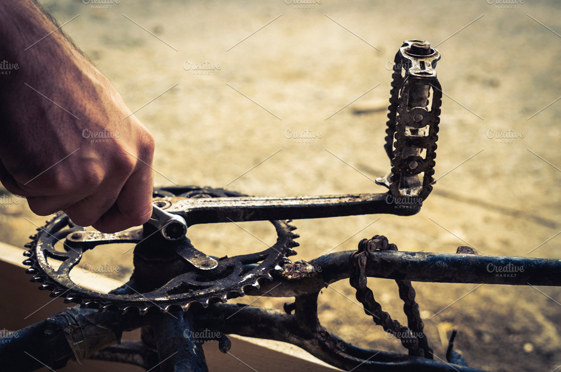 Mechanic hands repairing a bike, a Transportation Photo by Irantzu Arbaizagoitia