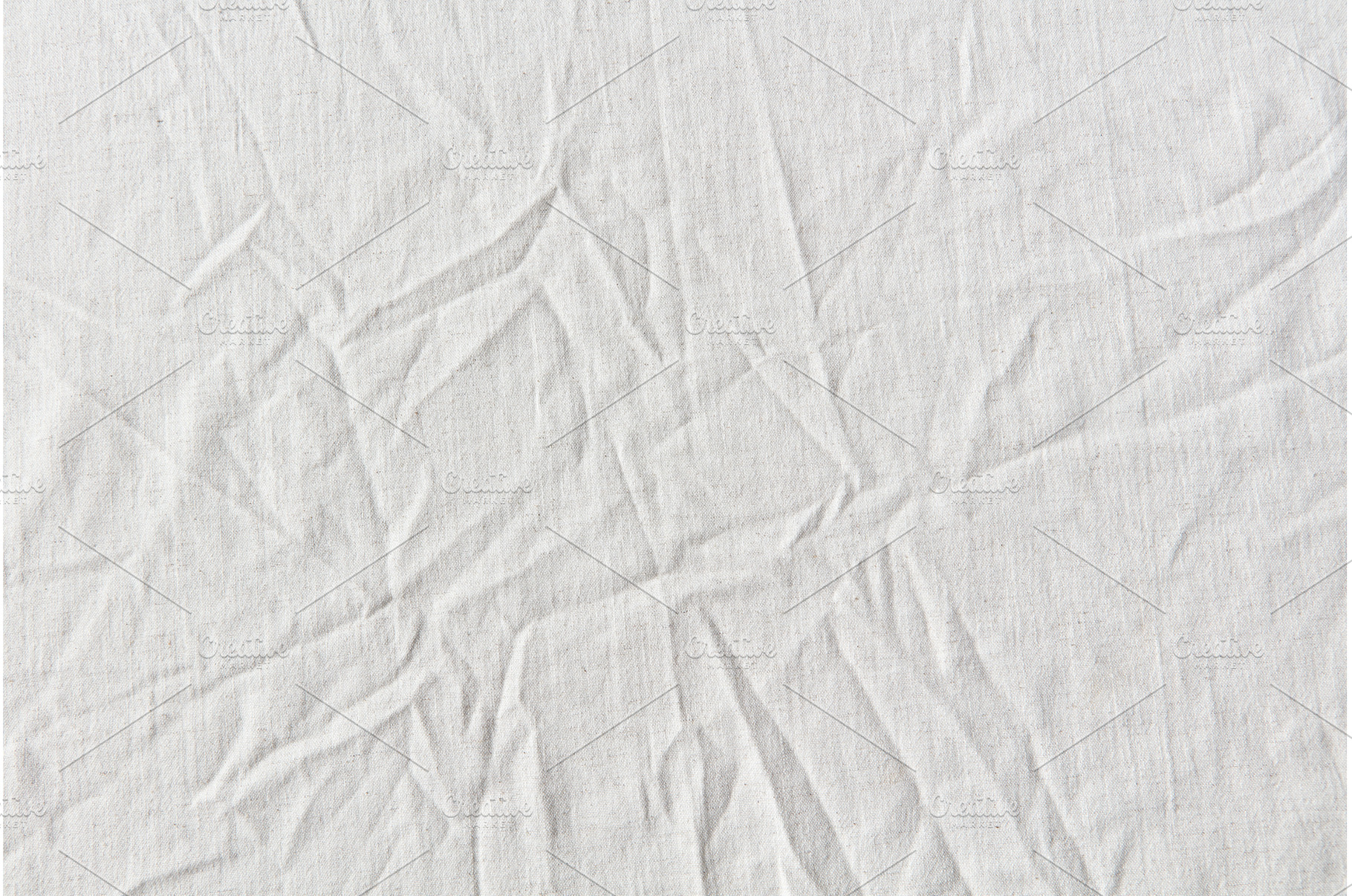 Natural crumpled white linen textile, an Abstract Photo by Yaroslav Danylchenko