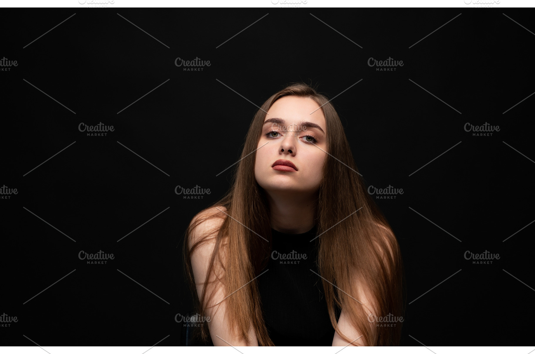 Young woman with long brown hair, a Person Photo by volodymyrshtun13795