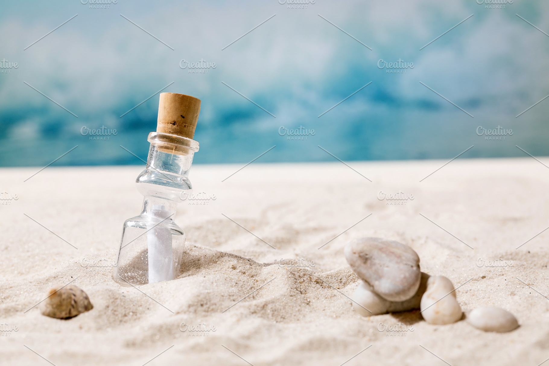 Summer sand sea beach with waves and glass botle with message, a Nature Photo by Natasha Breen