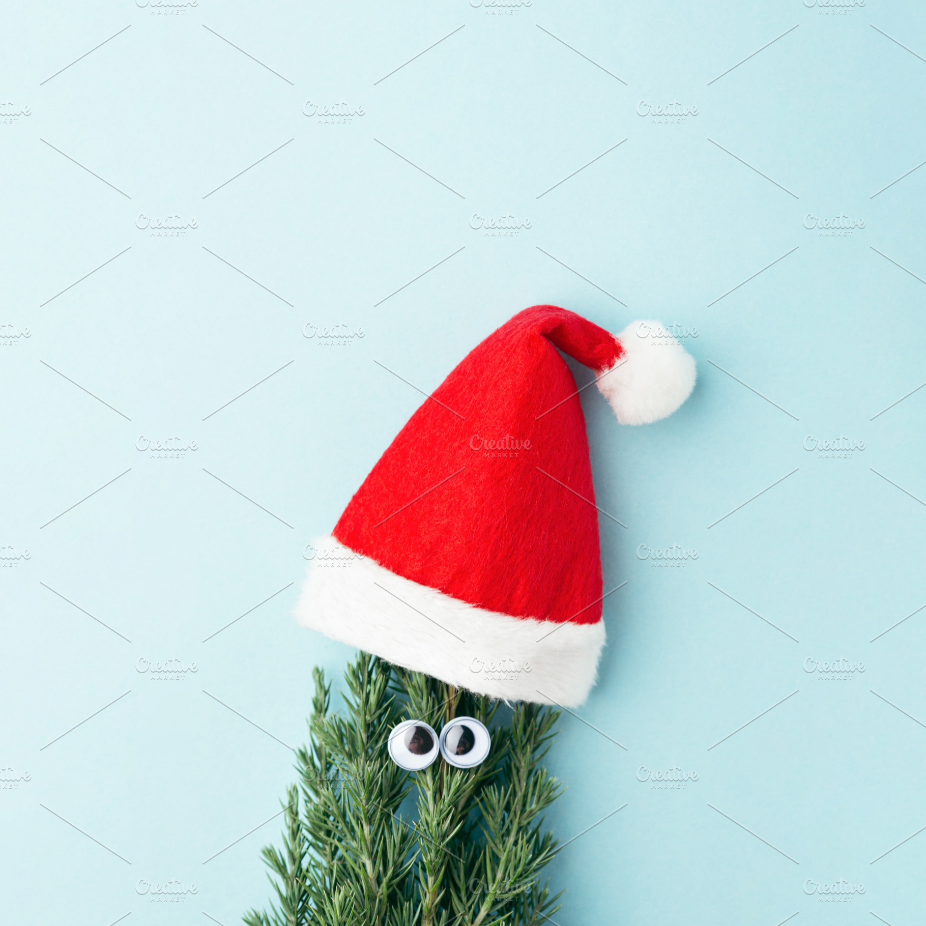 Concept of Christmas tree on blue, a Holiday Photo by Olga_Z