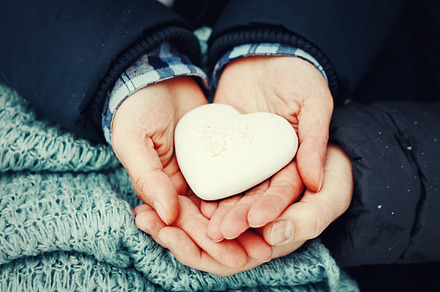 Man and woman hands holding heart, a Holiday Photo by Daria Photo