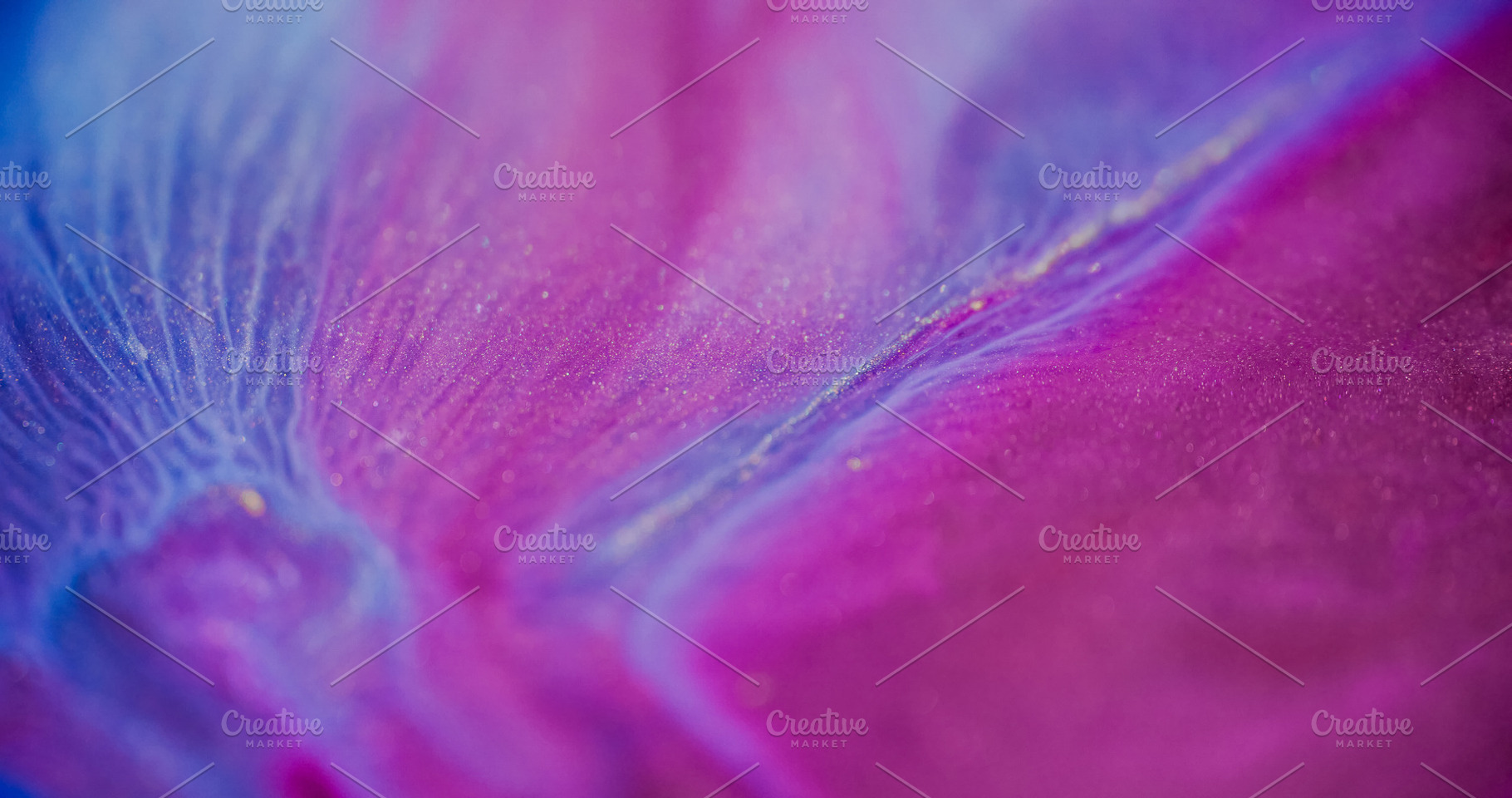 Glittering mix defocused creative shimmer liquid, a Background Photo by Photo Drive Studio
