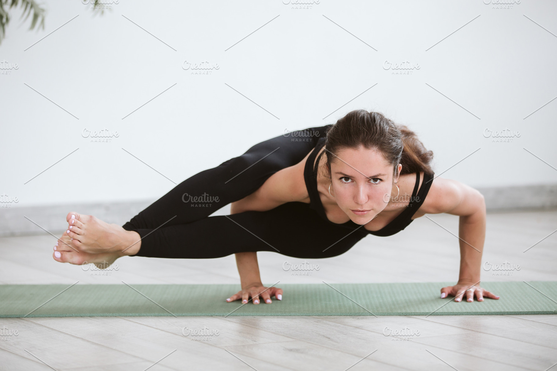 Beautiful girl doing yoga at home featuring yoga, woman, and adult, a Sports & Recreation Photo by Vladimir Popovich