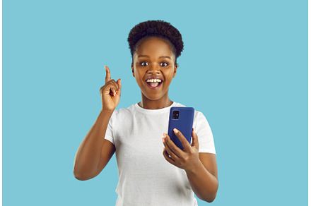 Afroamerican laughing girl pointing, a Person Photo by StudioRomantic