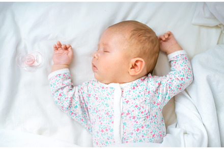 Newborn baby sleeps on a white bed, a Person Photo by yanadjana