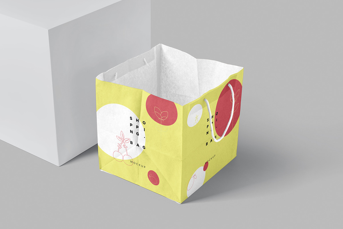 Kraft Paper Shopping Bag Mockups, a Packaging Mockup by DesignNeutrons (Photo 1 of 7)