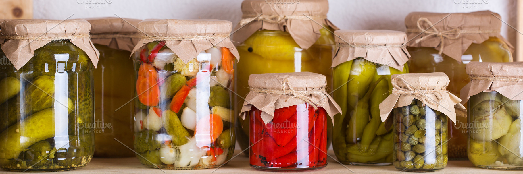 Homemade preserved and fermented food, pickled and marinated veg, a Food & Drink Photo by Antonina Vlasova