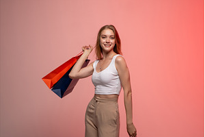 Young woman smiling, carrying, a Person Photo by volodymyrshtun13795